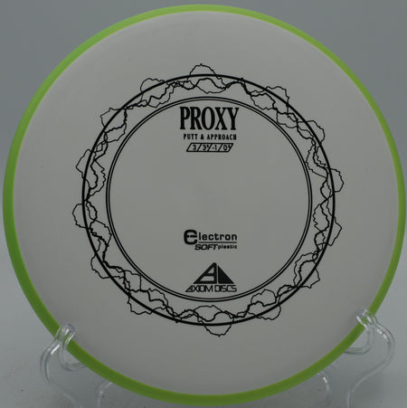 Electron Soft Proxy Axiom soft plastic putter floating on a turnover approach at Idlewild Disc Golf Course in Burlington, Kentucky.
