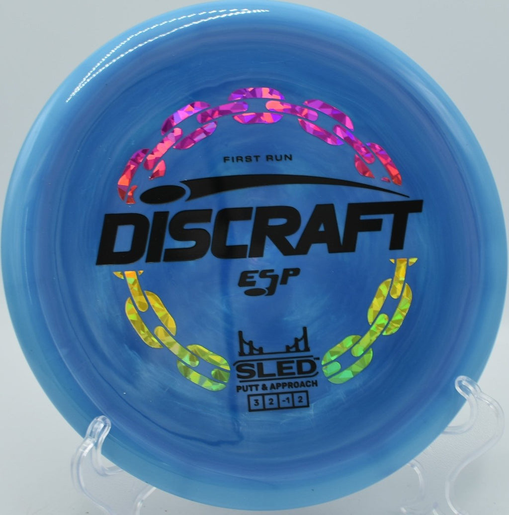 ESP First Run ESP Sled stable glide approach finishing near basket at Shore Acres Disc Golf Course in Saugatuck, Michigan