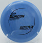 An Innova Pro Gorgon flipping up and gliding through the tight wooded fairways of Nevin Park Disc Golf Course in Charlotte, North Carolina.