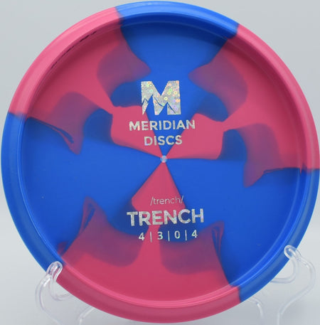Marbled Graphite Trench fairway driver holding a straight tunnel shot at Rolling Pines Disc Golf Course in Wilkesboro, North Carolina