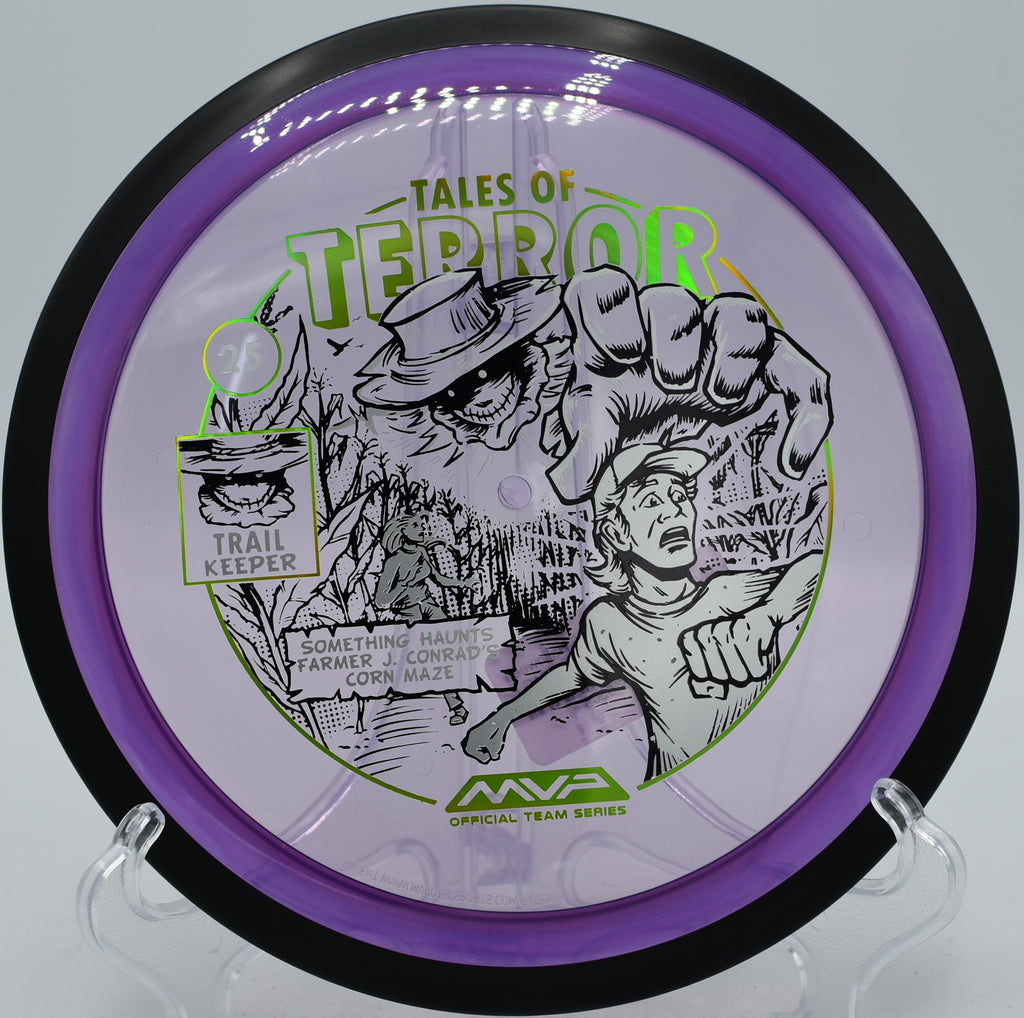 Trail by MVP in Proton plastic with Halloween 2025 stamp, flying laser-straight through dense trees at Glenwood DGC in Prattville AL.