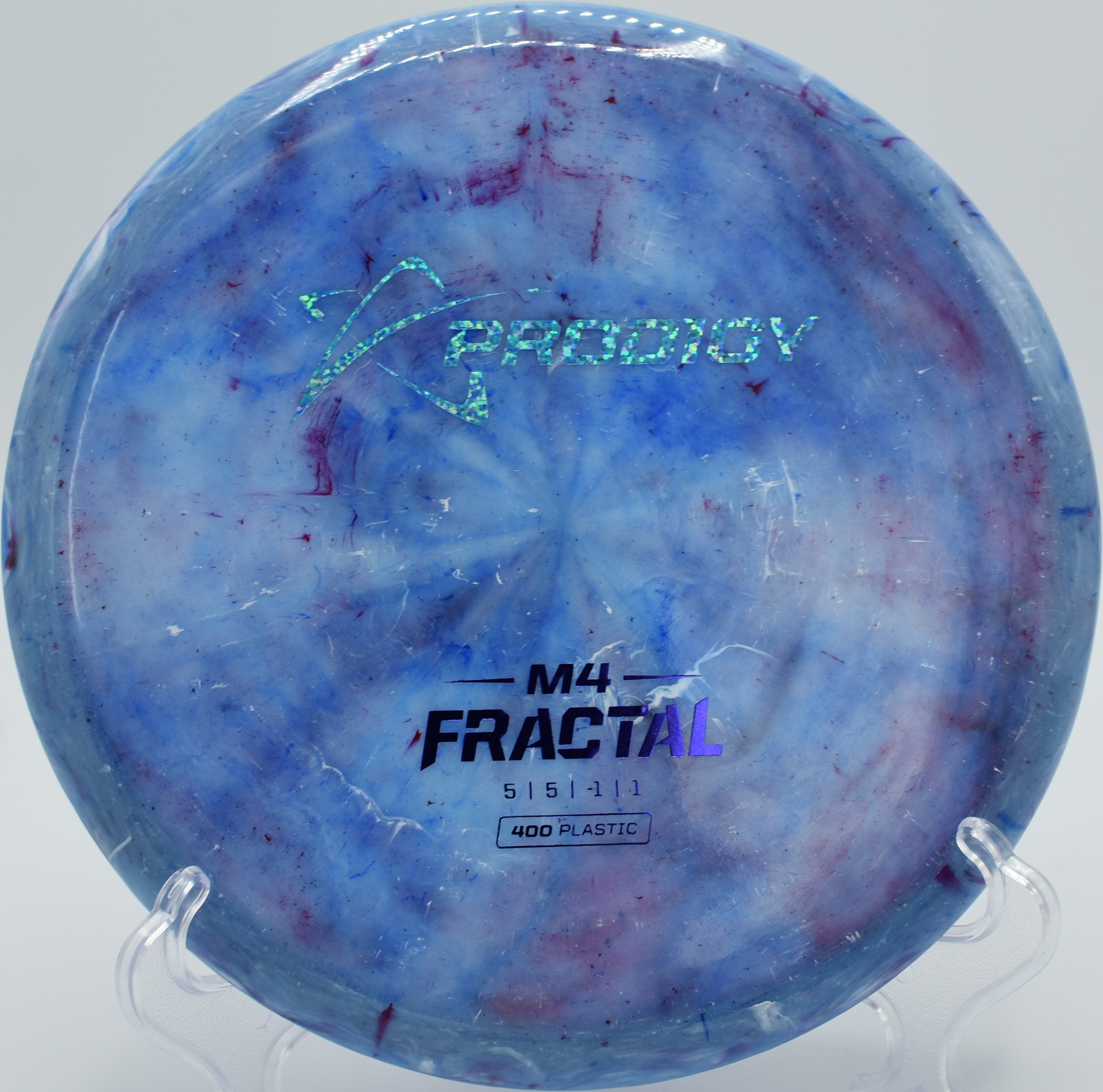 400 Fractal M4 disc golf midrange shaping a smooth hyzer flip at Heritage Farm Disc Golf Course, Adrian, Michigan