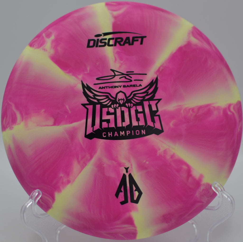 Swirled CT Focus resting near a rocky edge at Hyzer Creek DGC in Galway, NY, showcasing its slightly overstable finish.