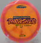 A red Z Swirl Thrasher on edge rolling across fairway at Paul McBeth's home course in Lynchburg, Virginia.

