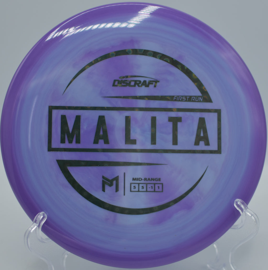 ESP Malita released flat for a controlled approach at Brookside Park Disc Golf Course in Indianapolis, Indiana.