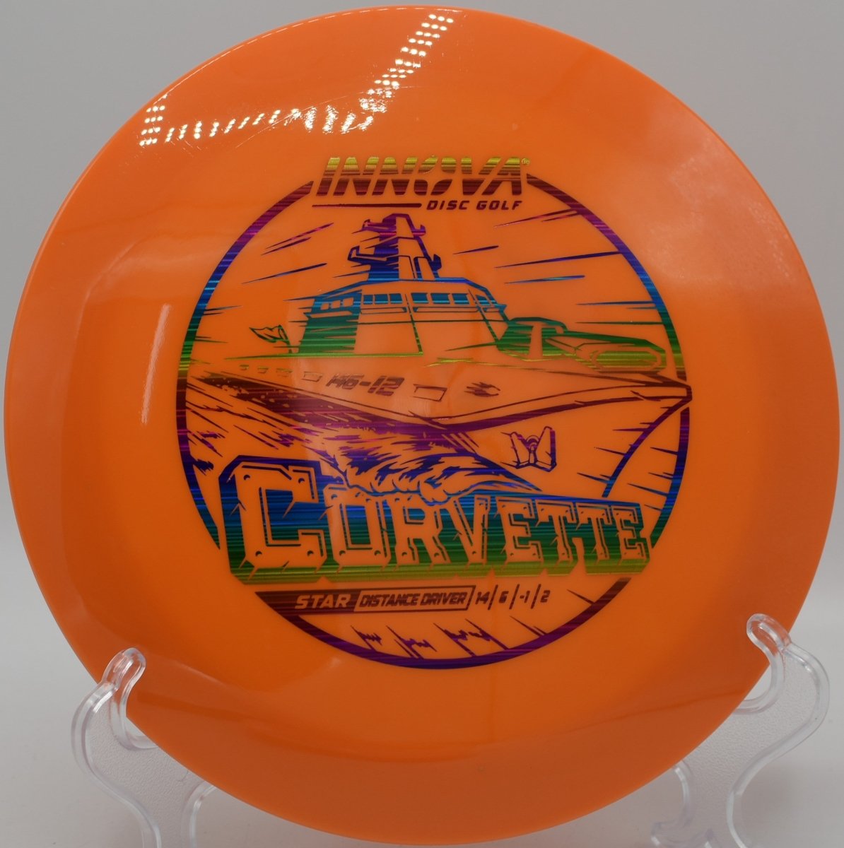 Innova Star Corvette distance driver launching a full-power backhand with strong fade at Coon Rapids Dam Disc Golf Course in Coon Rapids, Minnesota