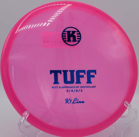 K1 Tuff stable putter beside the cage after a controlled upshot at Riverview Park Disc Golf Course in Elkhart, Indiana