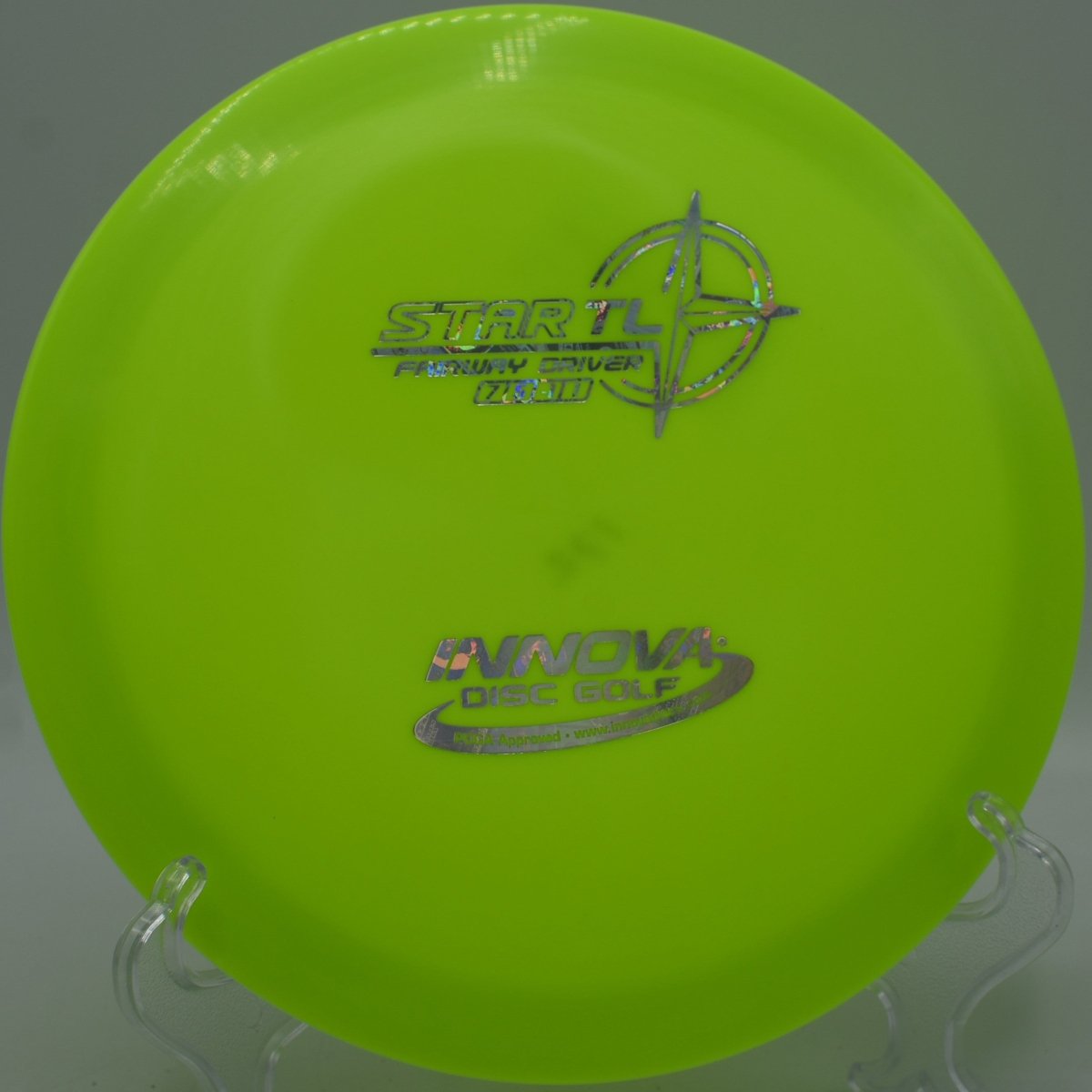 Star TL fairway driver staged for a straight tunnel drive at North Park Disc Golf Course in Haltom City, Texas