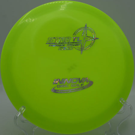 Star TL fairway driver staged for a straight tunnel drive at North Park Disc Golf Course in Haltom City, Texas