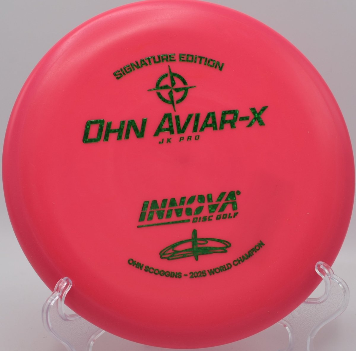 JK Aviar-X putter resting under basket chains after a confident putt at DeLaveaga Disc Golf Course in Santa Cruz, California