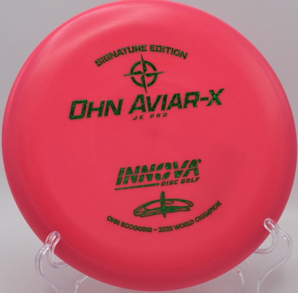 JK Aviar-X putter resting under basket chains after a confident putt at DeLaveaga Disc Golf Course in Santa Cruz, California