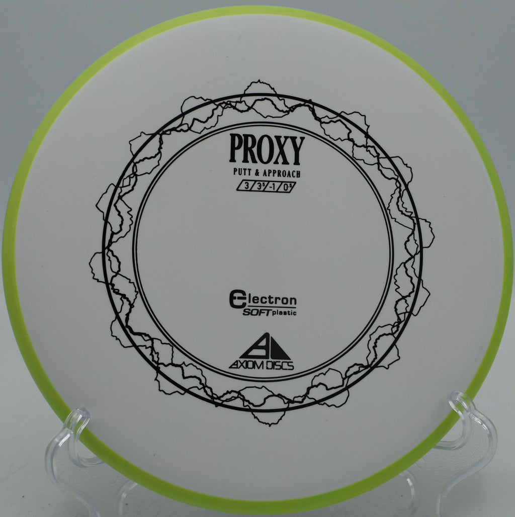Axiom Proxy in Electron Soft plastic landing softly near the basket at Hornets Nest Disc Golf Course in Charlotte, North Carolina.