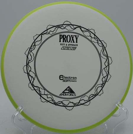 Axiom Proxy in Electron Soft plastic landing softly near the basket at Hornets Nest Disc Golf Course in Charlotte, North Carolina.