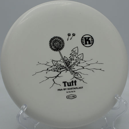 Kastaplast K3 Tuff putter fading gently toward the basket at Lincoln Ridge Disc Golf Course in Independence, Kentucky.