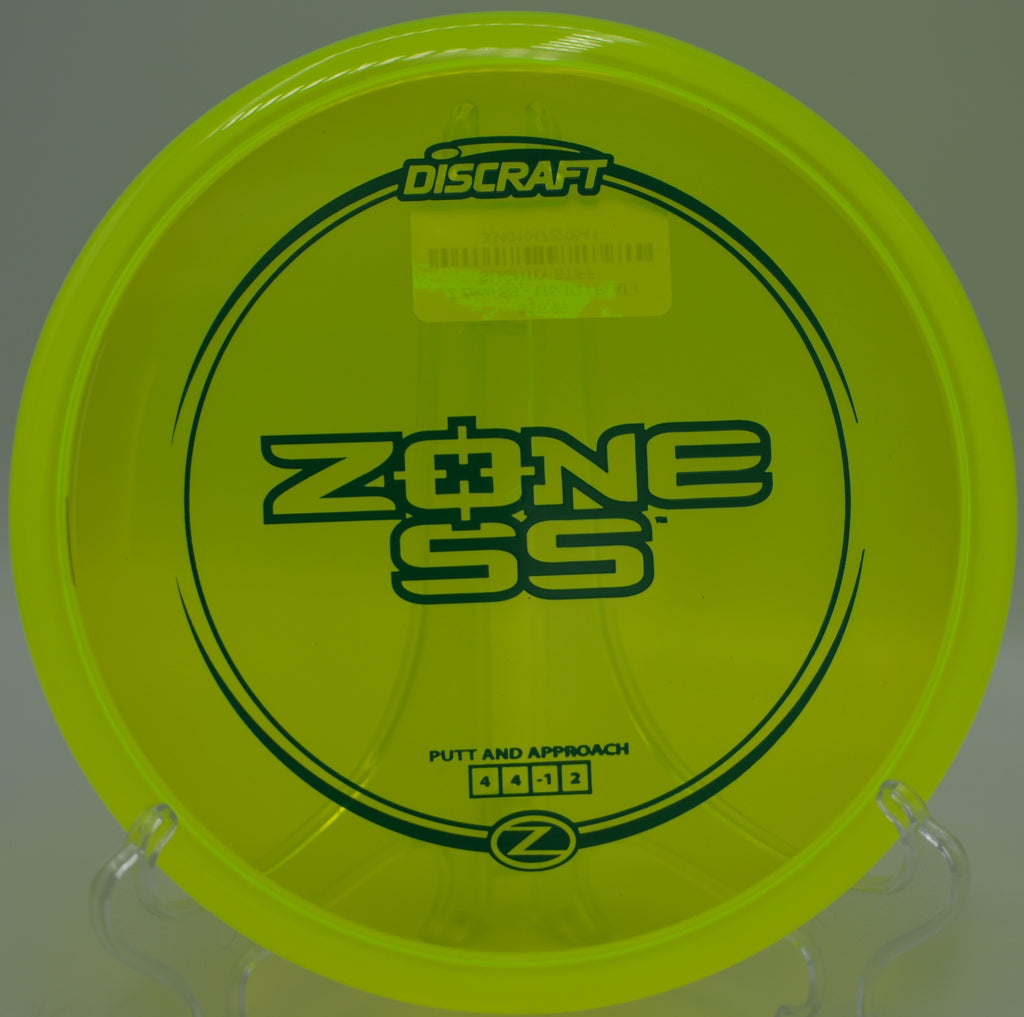 Player throwing the Discraft Z Zone SS on a straight shot toward the pin at Lake Casitas Disc Golf Course in Ventura, California.