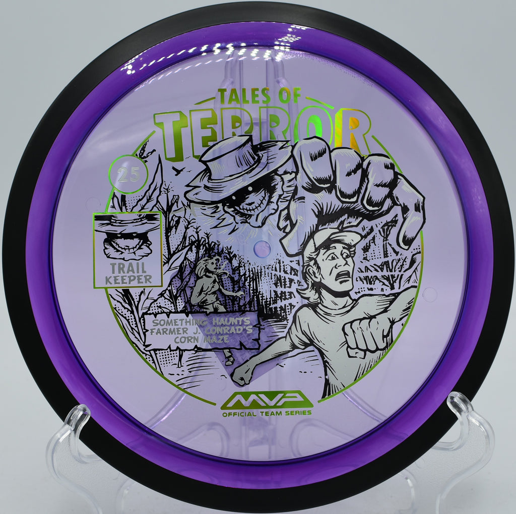 Halloween-themed MVP Proton Trail disc captured over basket 3 at Milo McIver State Park, Estacada OR, perfect for shaping late-turning drives.