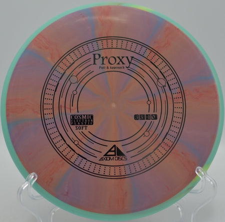 Axiom Cosmic Electron Soft Proxy delivering confident grip and straight flight on a finesse putt at Sunset Lakes Disc Golf Course in Hudson, Florida