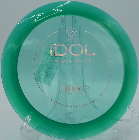 Mint Discs Eternal Idol dependable driver flying a straight-to-fade shot at Idlewild Disc Golf Course in Burlington, Kentucky