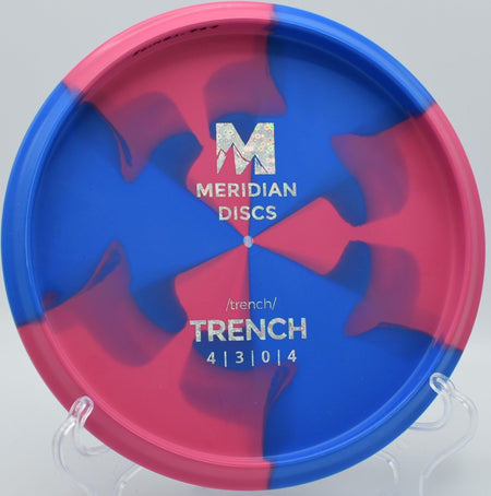 Marbled Graphite Trench control driver parked near the basket after a precision fairway shot at Cane Ridge Advanced Disc Golf Course in Nashville, Tennessee