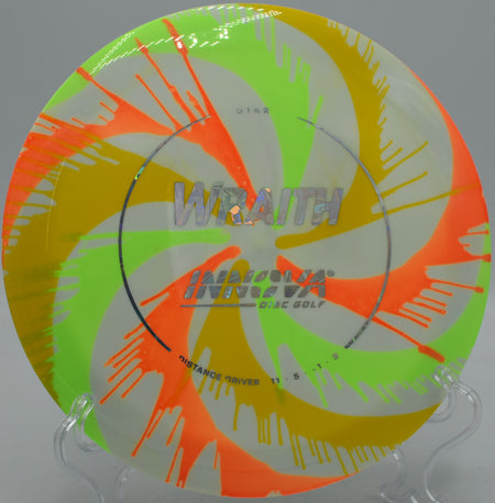 Disc golfer throwing an I-Dye Star Wraith on a long hyzer line at Hornets Nest Park in Charlotte, North Carolina