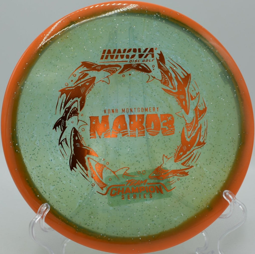 Innova Halo Champion Metal Flake Mako3 disc golf midrange flying flat at North Boundary Disc Golf Course in Cranberry Pennsylvania