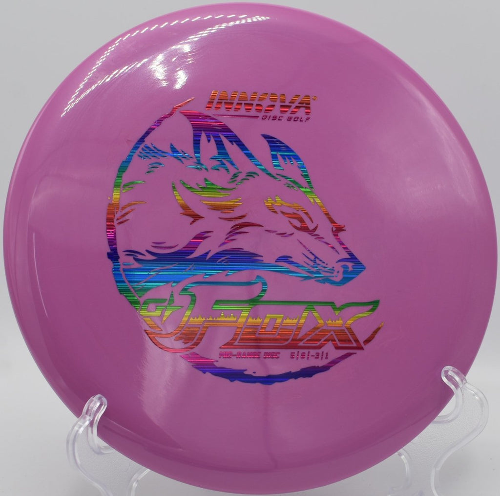 Innova G-Star Fox midrange throwing a flat release shot with gentle turn at Murray Park Disc Golf Course in Little Rock, Arkansas