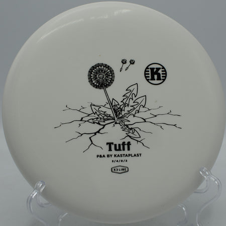 K3 Tuff Kastaplast reliable putter settling beside the pin at DeLaveaga Disc Golf Course in Santa Cruz, California.