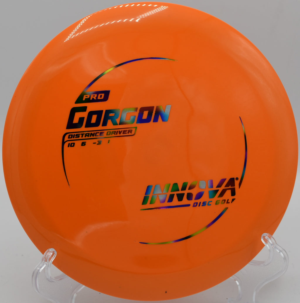 An Innova Pro Gorgon navigating the technical fairways at Rockwall Disc Golf Course in Rockwall, Texas, with a precise backhand throw.
