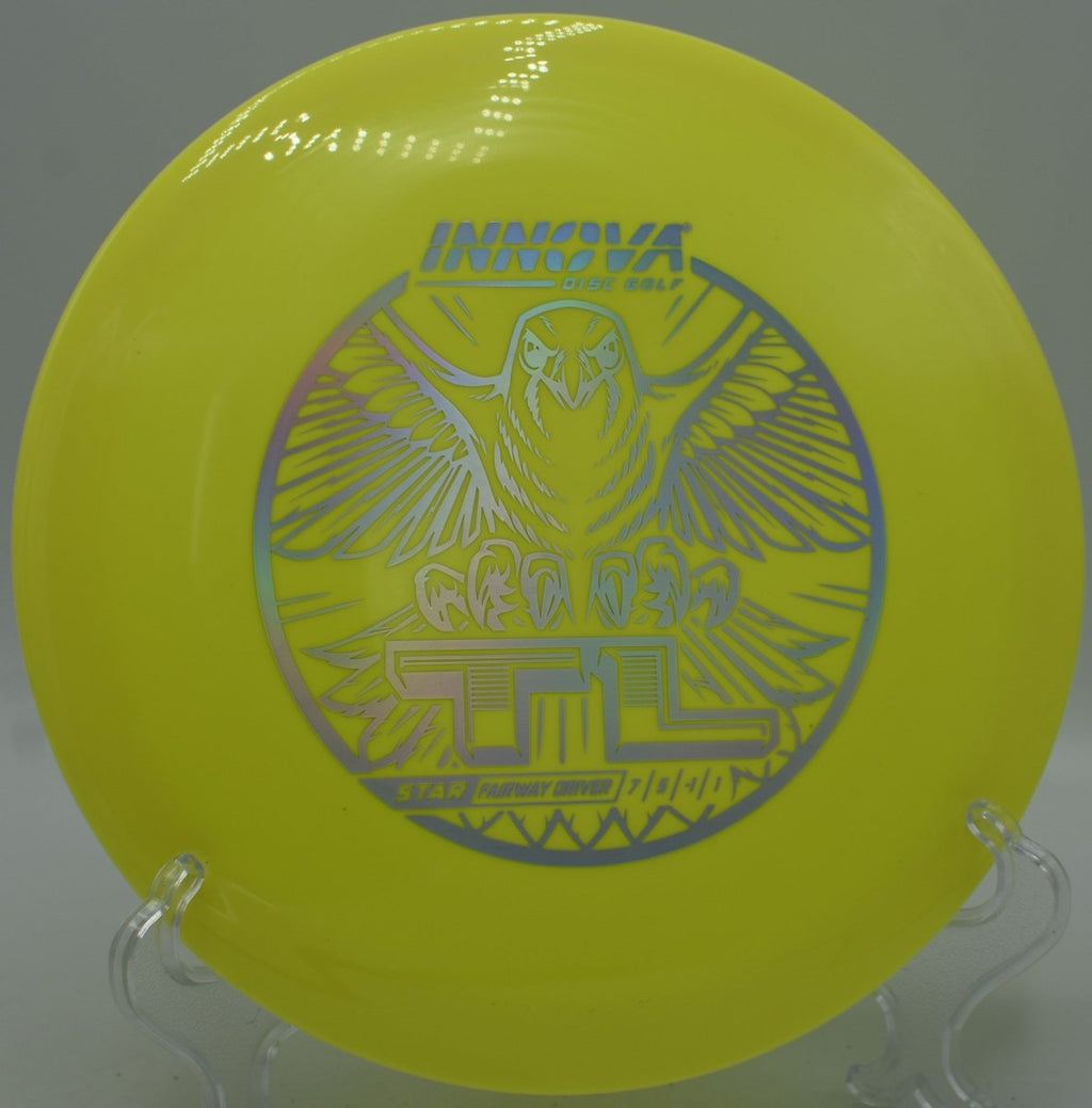 Innova Star TL driver gliding through fairway gap on a clean release at Indian Camp Creek Disc Golf Course in Foristell, Missouri