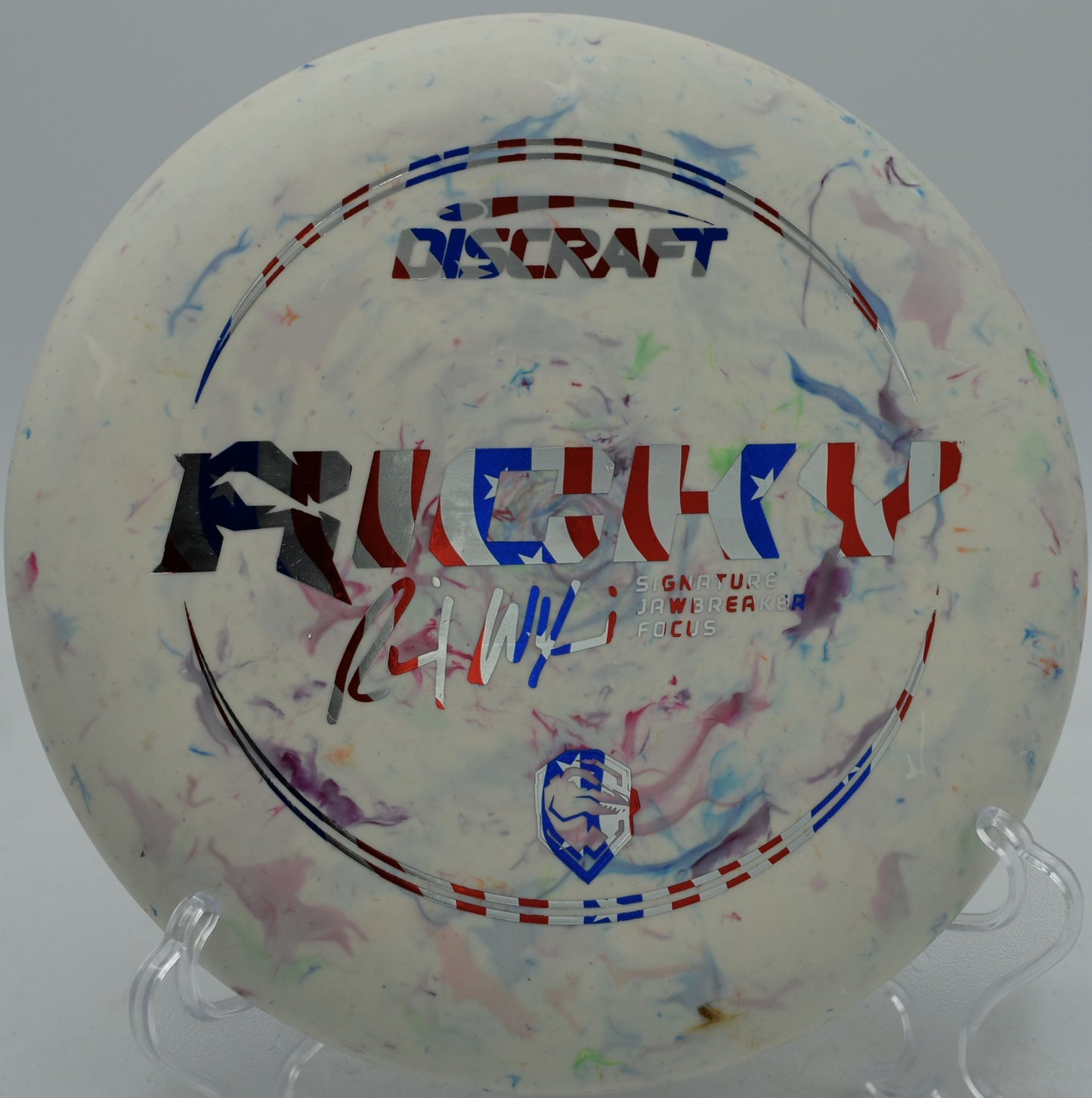 Jawbreaker Focus Ricky Wysocki edition disc spinning smoothly on a push putt at Blue Ribbon Pines Disc Golf Course in East Bethel, Minnesota.