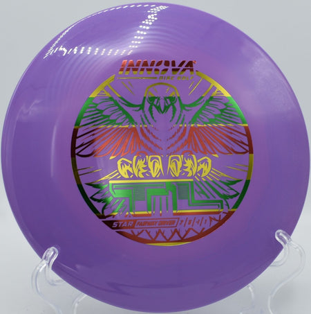 Star TL fairway driver parked under basket after a glidey straight shot at Lake Eureka Disc Golf Course in Eureka, Illinois