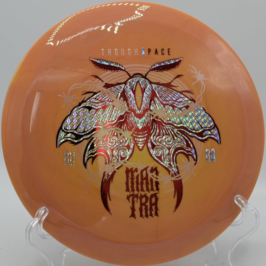 TSA Mantra driver executing a smooth flex shot toward the basket at Cane Ridge Advanced Disc Golf Course in Nashville, Tennessee