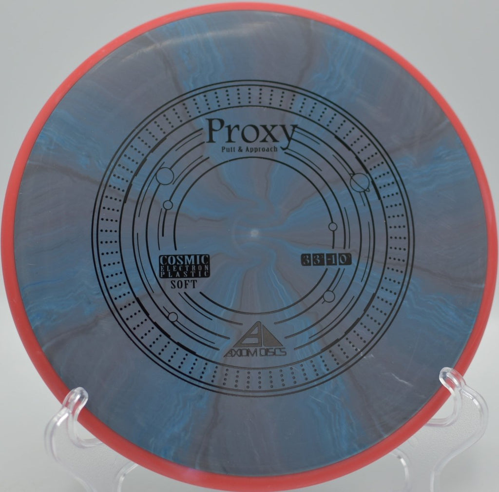 Cosmic Electron Soft Proxy putter catching chains cleanly after a soft release at Moraine State Park Disc Golf Course in Portersville, Pennsylvania