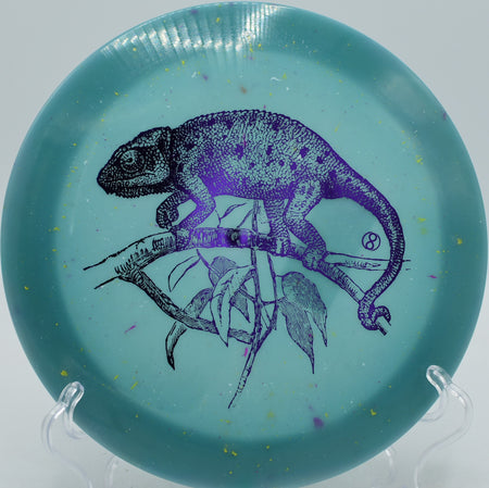 Splatter S-Blend X-Out Pharaoh Infinite Discs high-speed driver gliding with controlled fade at Idlewild Disc Golf Course in Burlington, Kentucky.
