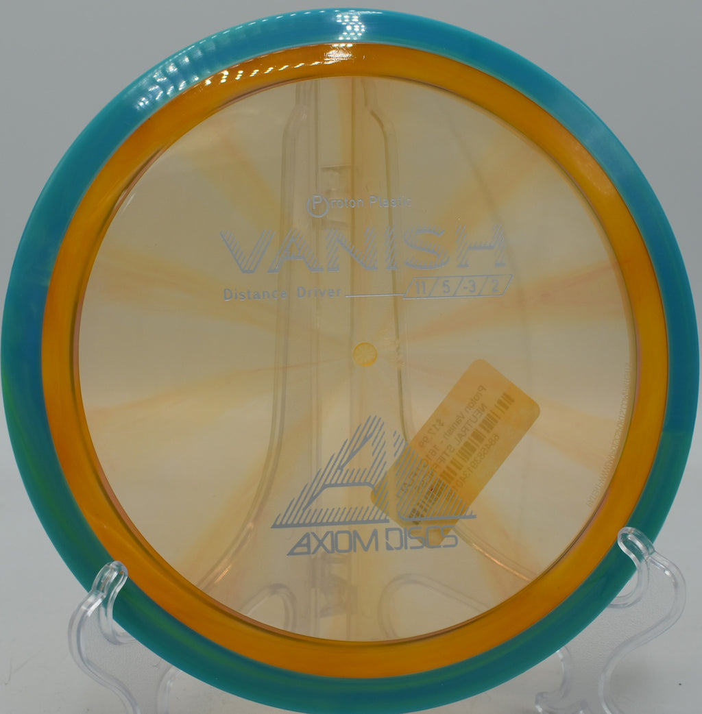 Axiom Proton Vanish executing a smooth hyzer flip at Tyler State Park in Newtown, Pennsylvania.

