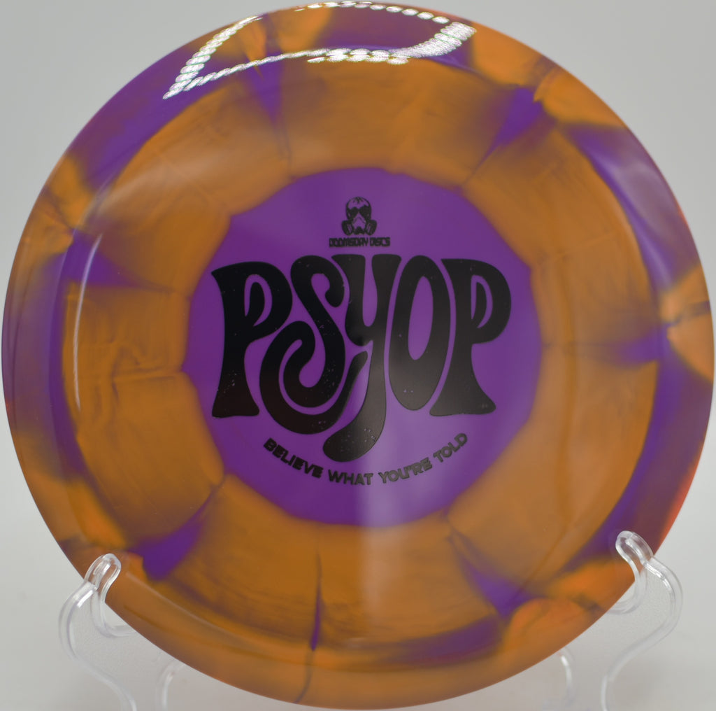 Psyop distance driver in Retina plastic gliding straight at Hornets Nest Disc Golf Course in Charlotte, North Carolina