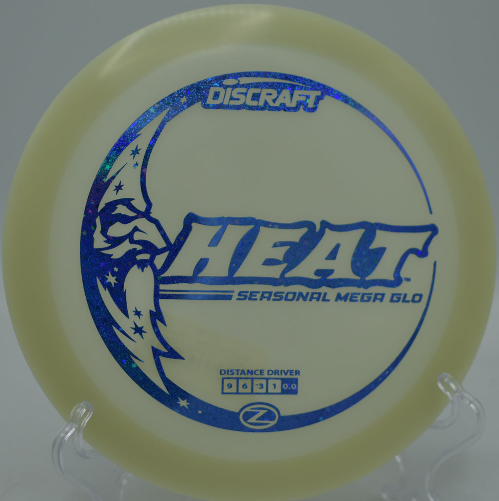 Player releasing a glowing Heat on a clean hyzer-flip line at Milo McIver State Park Disc Golf Course in Estacada, Oregon.