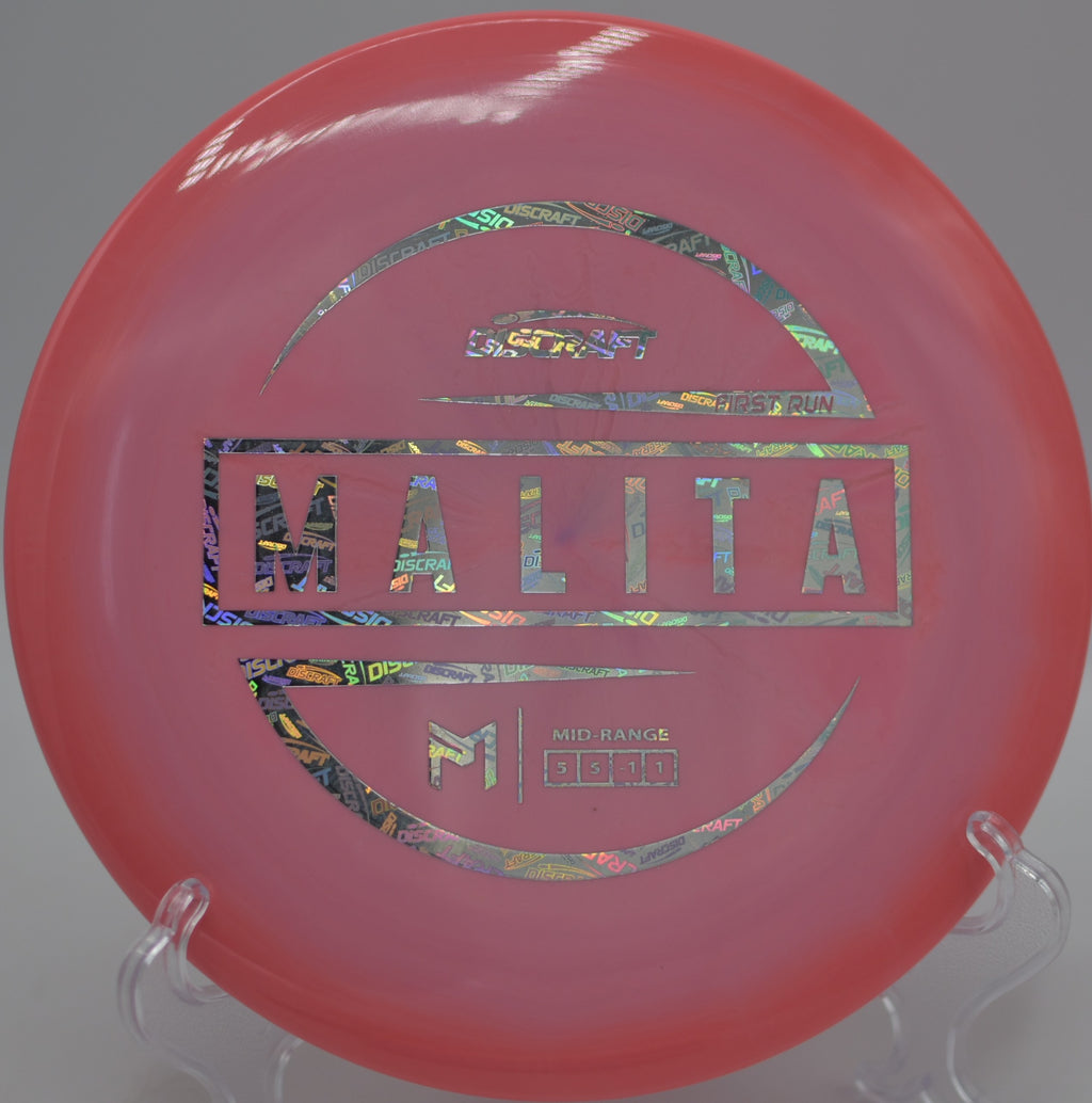 Player gripping the McBeth ESP Malita for a straight standstill approach at Washington Township Park Disc Golf Course in Avon, Indiana.