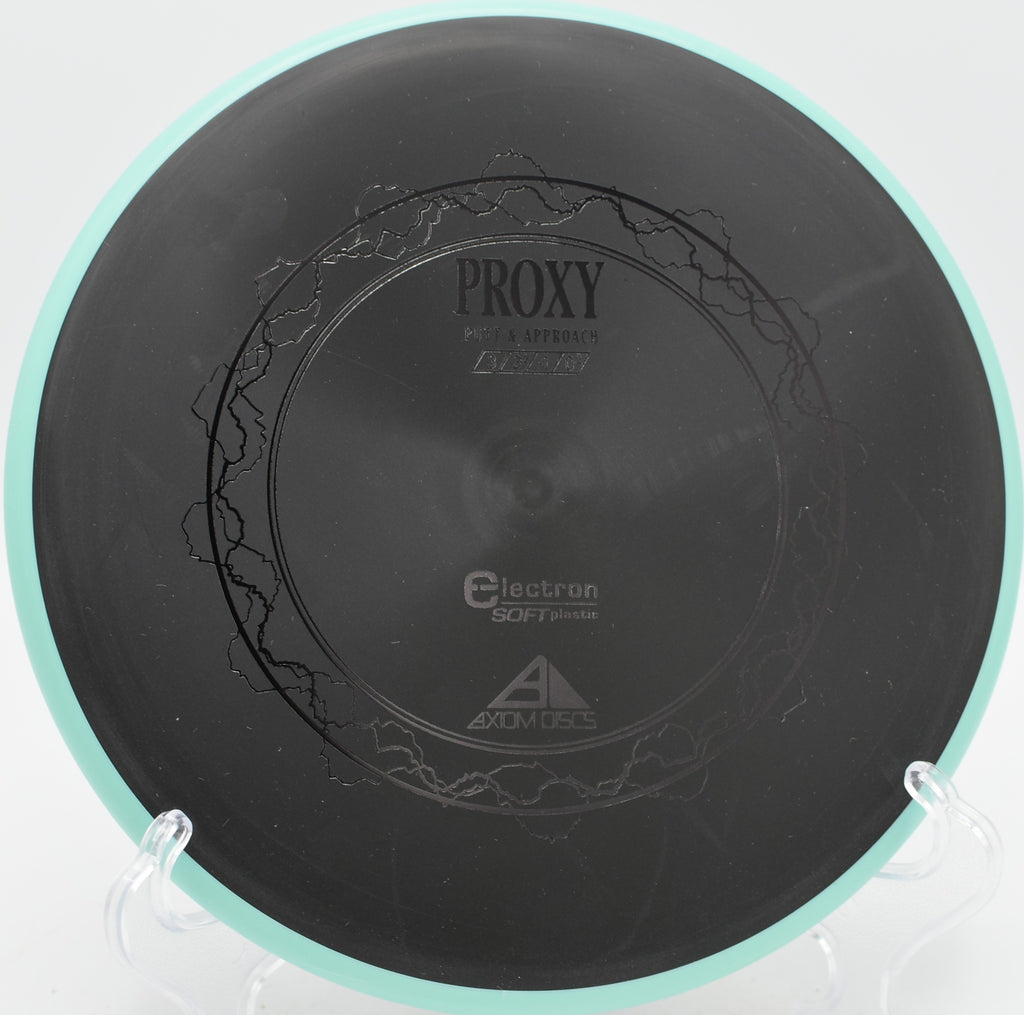 Proxy Electron Soft plastic by Axiom gliding with minimal fade at Blue Ribbon Pines Disc Golf Course in East Bethel, Minnesota.
