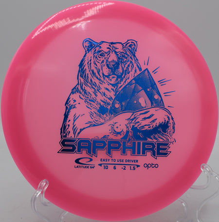 Latitude 64° Opto Moonshine Sapphire glow disc floating long and straight at Hornets Nest Disc Golf Course in Charlotte, North Carolina.