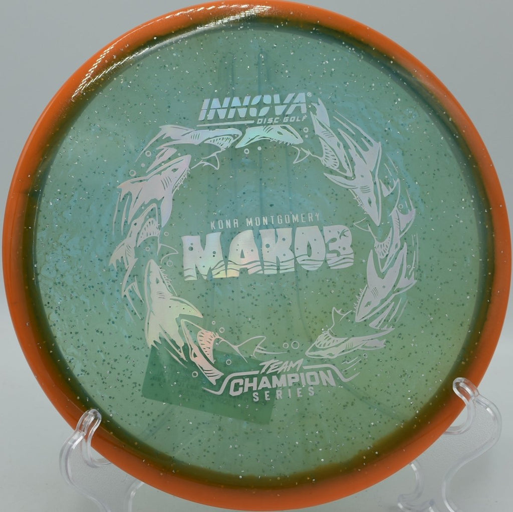 Innova Halo Champion Metal Flake Mako3 disc golf midrange holding tunnel line at Nevin Park Disc Golf Course in Charlotte North Carolina