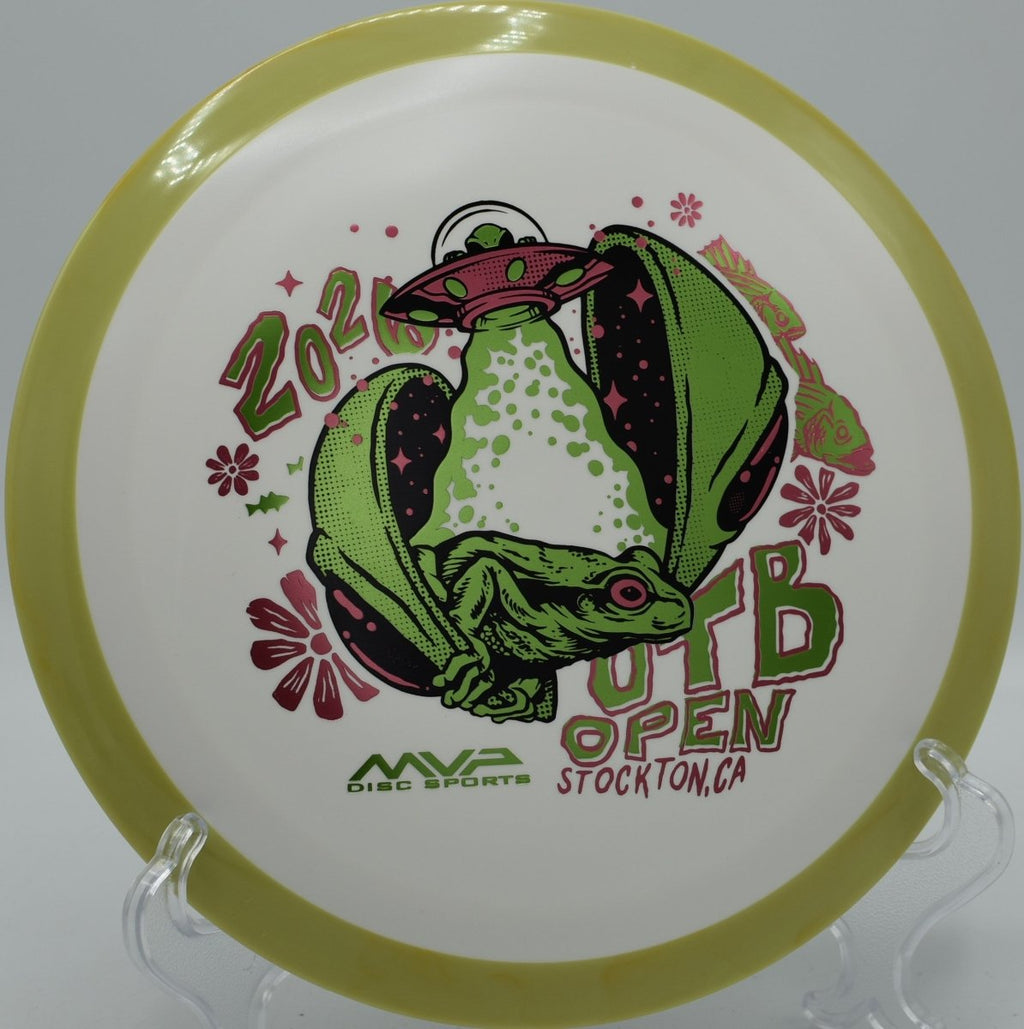 Axiom Delirium Fission OTB Open edition driver resting in fairway grass at Diavolo Disc Golf Course in Cary, North Carolina