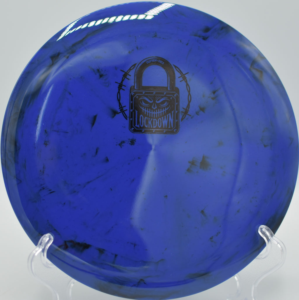 Shockwave Lockdown firing a clean backhand drive at Red Gate Park DGC in Purcellville, VA, resisting turn and finishing with violent late fade.