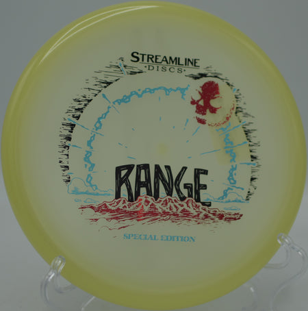 Streamline Eclipse Glow Range pushed long and straight on a putter drive at Beaver Ranch Disc Golf Course in Conifer, Colorado.