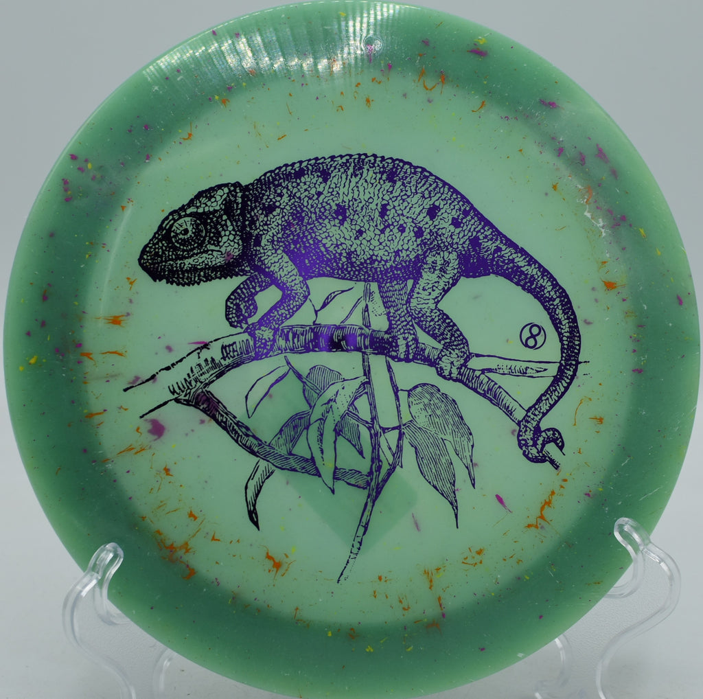 Infinite Discs Splatter S-Blend X-Out Pharaoh swirled driver carving flex lines at Hornets Nest Disc Golf Course in Charlotte, North Carolina.