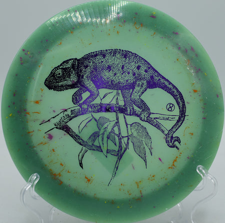 Infinite Discs Splatter S-Blend X-Out Pharaoh swirled driver carving flex lines at Hornets Nest Disc Golf Course in Charlotte, North Carolina.