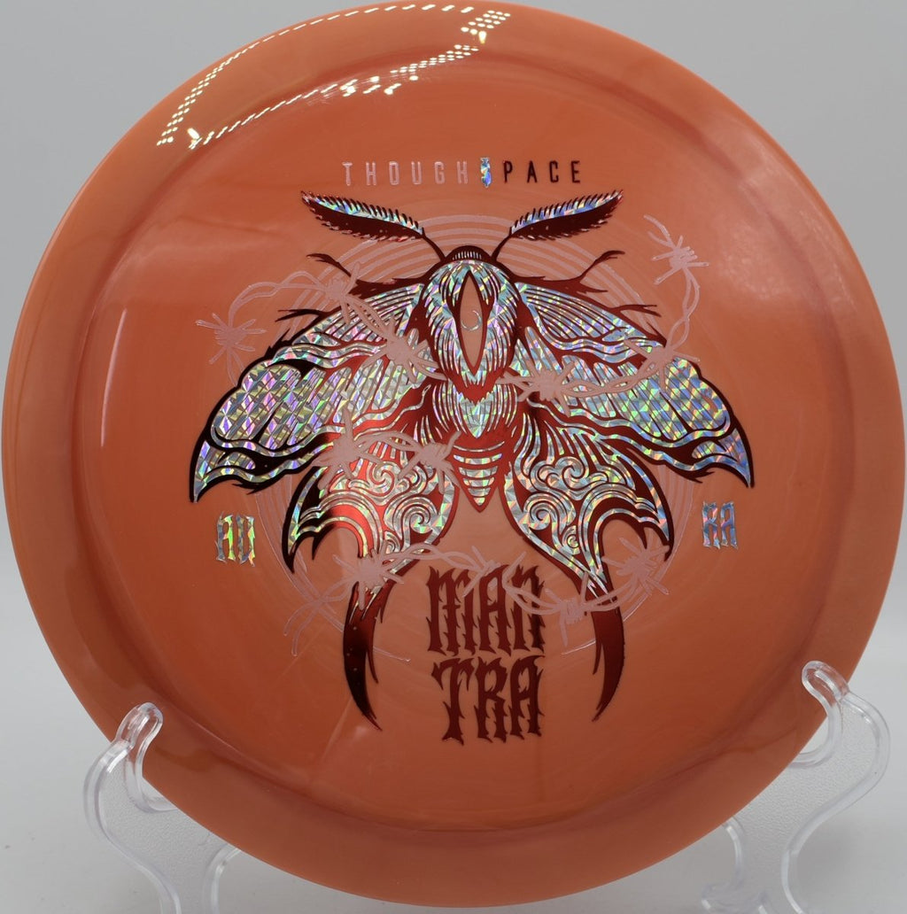 Mantra fairway driver driving a straight glide shot down tunnel fairway at Sandy Hollow Disc Golf Course in Rockford, Illinois