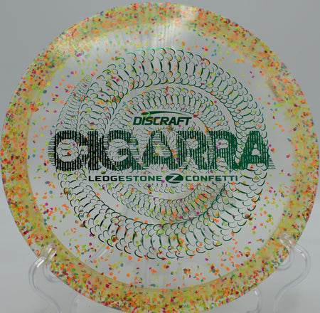 Discraft Confetti Z Cigarra released with hyzer flip at Sunset Park Disc Golf Course in Las Vegas, Nevada