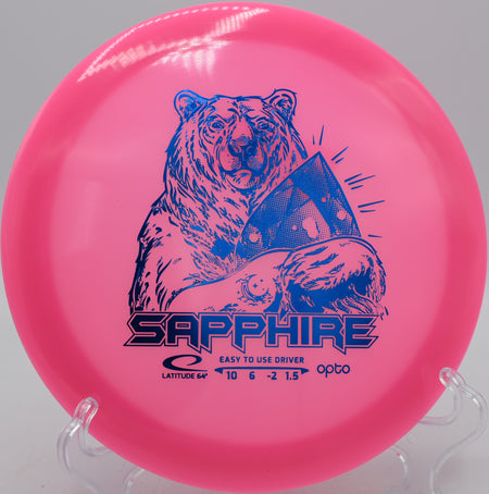 Opto Moonshine Sapphire Latitude 64° lightweight glow driver carving an anhyzer at Moraine State Park Disc Golf Course in Portersville, Pennsylvania.
