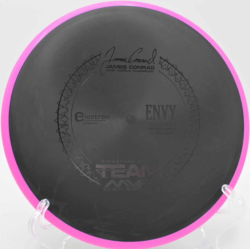 Electron Envy gliding long on a driving putter line at Rollin Ridge Disc Golf Course in Reedsville, Wisconsin.